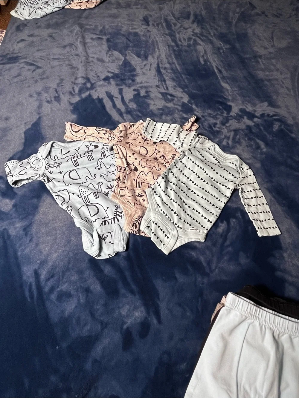 Newborn shirts and pants  9 pc bundle.  3 tops & 6 footed pants